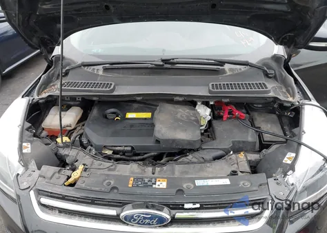 2015 Ford Escape Titanium z USA, uszkodzony, nr VIN 1FMCU0JX2FUC20718